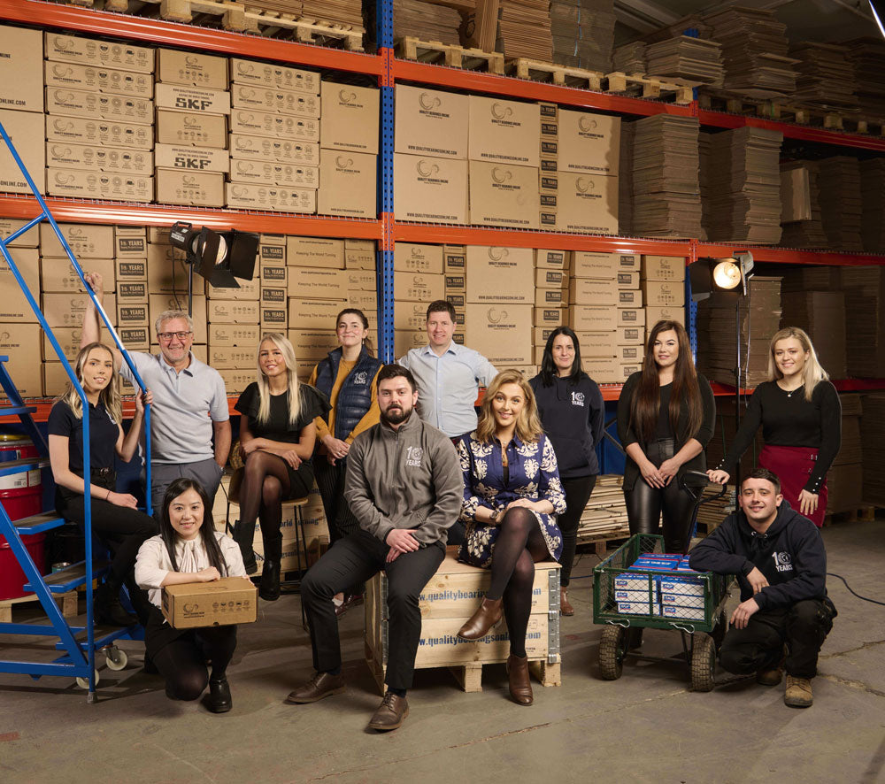 Members of the Quality Bearings Online Limited Team in the warehouse